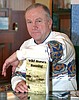 Plains man finishes third book
