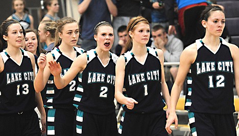 &lt;p&gt;Lake City's Dailyn Ball(13), Jenny Kerr (22), Sydney Butler (2), Jansen Butler (1) and Katie Rowe (12) prepare to shake hands with Lewiston after visiting Timberwolves fell to the Bengals 52-50 in the championship game of the 5A Region 1 tournament Tuesday.&lt;/p&gt;