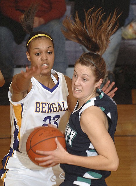 &lt;p&gt;Lake City's Dailyn Ball, right, rips the ball away from Lewiston Chelsea Waters during the first quarter Tuesday.&lt;/p&gt;