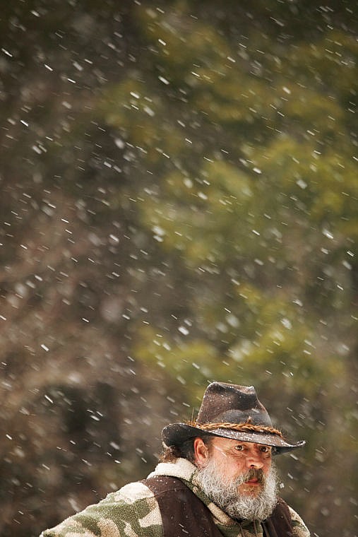 <p>Dana Ralphs watches races Saturday afternoon during the World Championship Barstool Races at the 35th Annual Cabin Fever Days in Martin City. Saturday, Feb. 9, 2013 in Martin City, Montana. (Patrick Cote/Daily Inter Lake)</p>