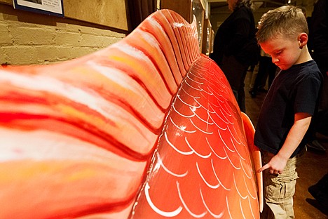 &lt;p&gt;Ethan Ross, 5, of Hayden, checks out a large fish on display Friday at the Human Right Education Institute's cultural exhibit &quot;Many Cultures, One World&quot; in Coeur d'Alene.&lt;/p&gt;