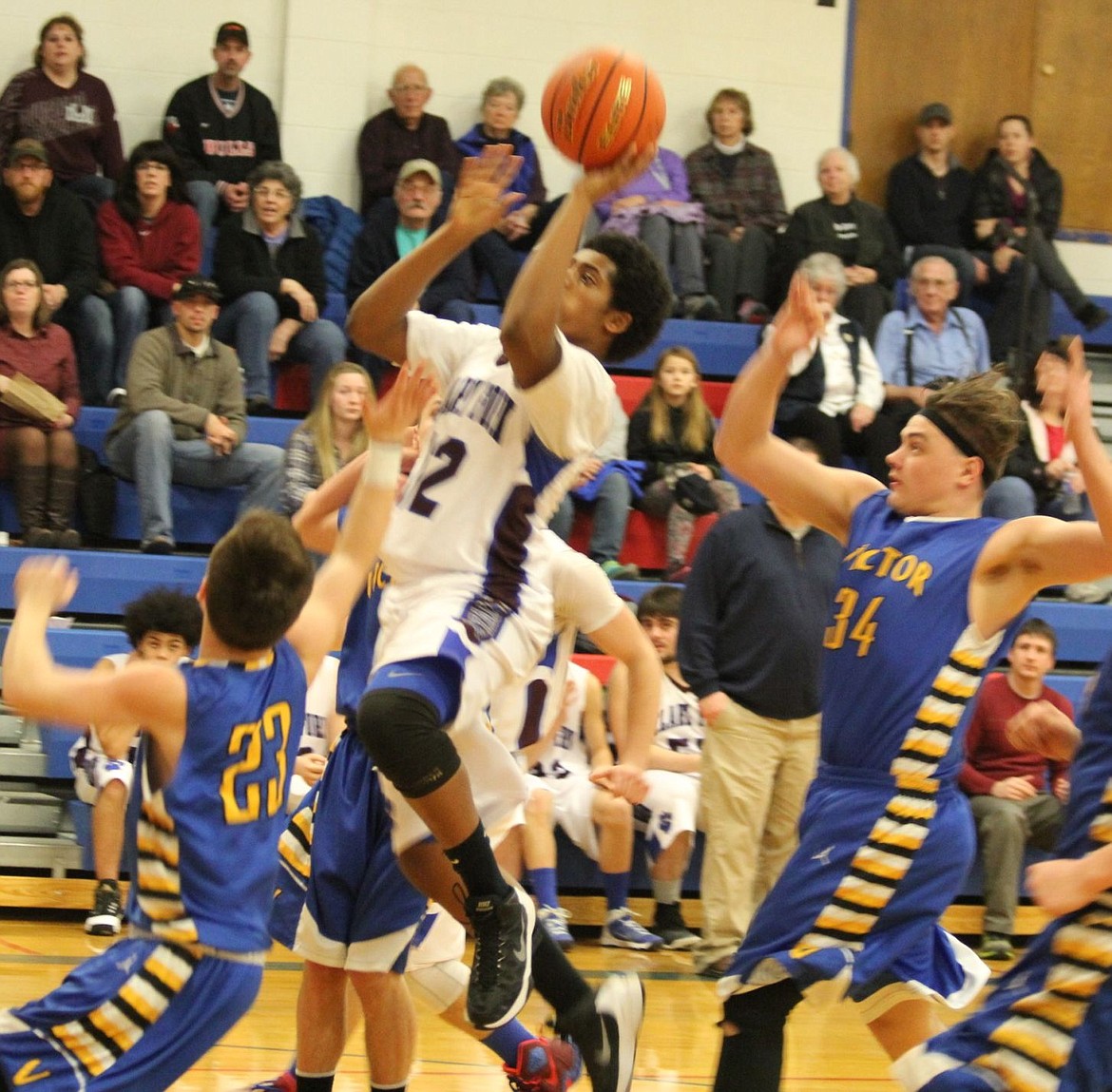 &lt;p&gt;Mountain Cat Mike Perkins pushes to the basket against the Pirates in Friday night&#146;s game in Superior. Aaron Kelly led the pack, taking the Cats to a 48-33 win.&lt;/p&gt;