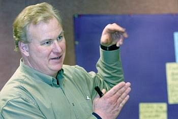 Ned Cooney, program director for the Flathead Nonprofit Development Partnership, talks with Flathead Land Trust board members and staff during a strategic planning session recently. Karen Nichols/Daily Inter Lake