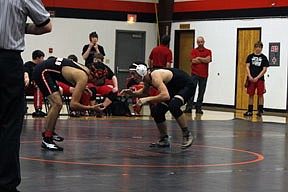 Kolby Chisholm, a 140 sophomore, qualified for state after being selected as an alternate thanks to his fifth place finish at divisionals.