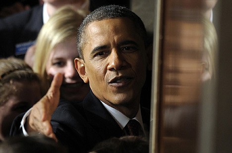 &lt;p&gt;President Barack Obama reaches out to shake hands after giving his State of the Union address on Capitol Hill in Washington on Jan. 24, 2012.&lt;/p&gt;