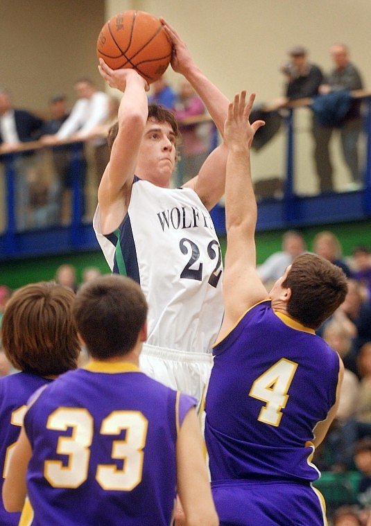 Glacier senior Logan Quay (22) shoots during the game against the Sentinel Spartans on Tuesday in Kalispell.