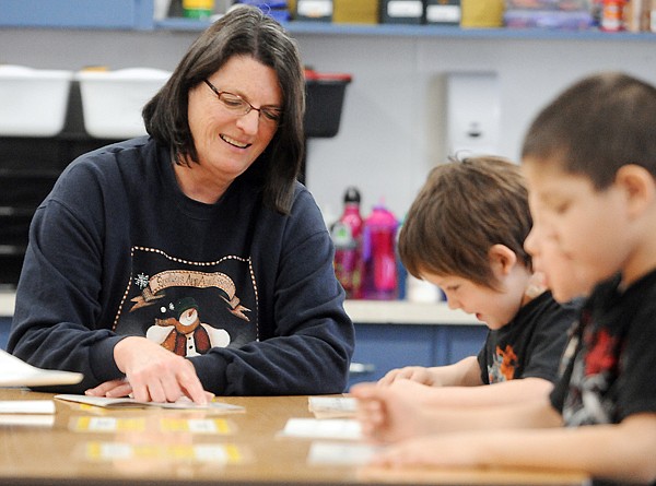 &lt;p&gt;LuAnn Servo works with students as a paraprofessional on Tuesday
at Elrod School in Kalispell.&lt;/p&gt;