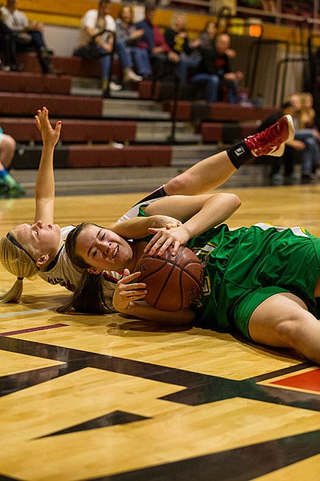 &lt;p&gt;Lakeland&#146;s Savannah Pruitt fights Moscow&#146;s Joelle Stephens for the ball in the first quarter.&lt;/p&gt;