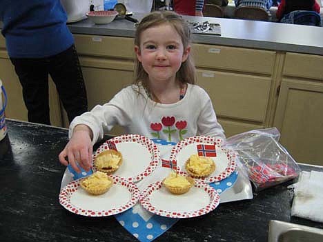 &lt;p&gt;Laila Handeen, 6, is pictured placing Norwegian flags atop ice cream.&lt;/p&gt;