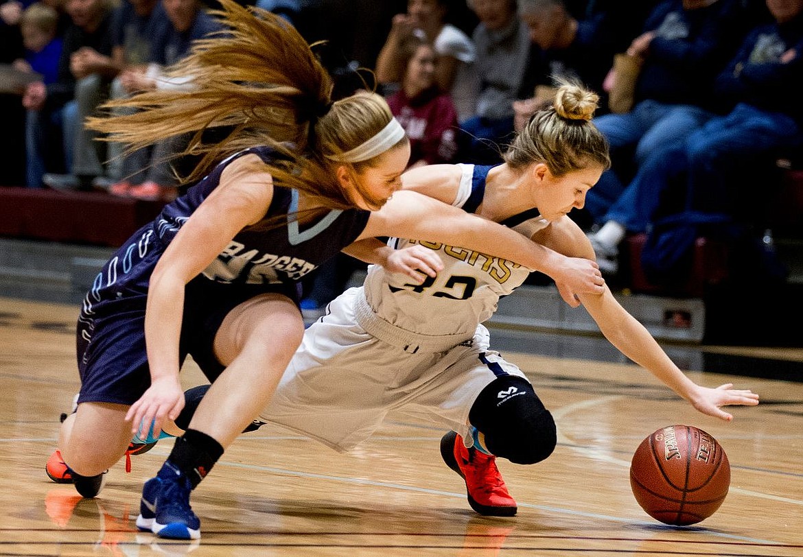 &lt;p&gt;JAKE PARRISH/Press Bonners Ferry's Kadi Bateman, left, scrambles for a loose ball with McKeeley Tonkin of Timberlake during the 3A District 1 championship game on Wednesday at North Idaho College.&lt;/p&gt;