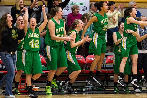 &lt;p&gt;Players from the Lakeland High School girls basketball bench celebrate after the Hawks beat Moscow High Monday in the 4A Region 1 tournament at North Idaho College in Coeur d&#146;Alene.&lt;/p&gt;