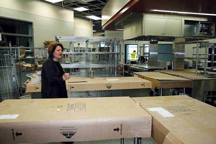 Columbia Basin Skills Center director Christine Armstrong gives a tour group a look at the new culinary skills class kitchen.