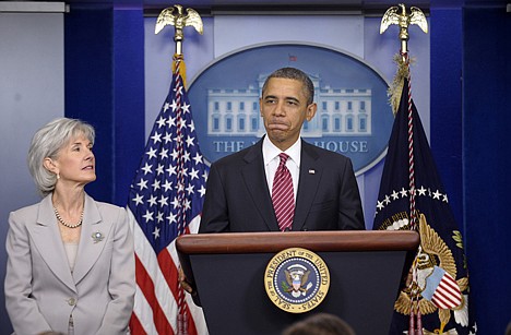 &lt;p&gt;President Barack Obama, accompanied by Health and Human Services Secretary Kathleen Sebelius, announces the revamp of his contraception policy requiring religious institutions to fully pay for birth control, Friday, in the Brady Press Briefing Room of the White House in Washington.&lt;/p&gt;