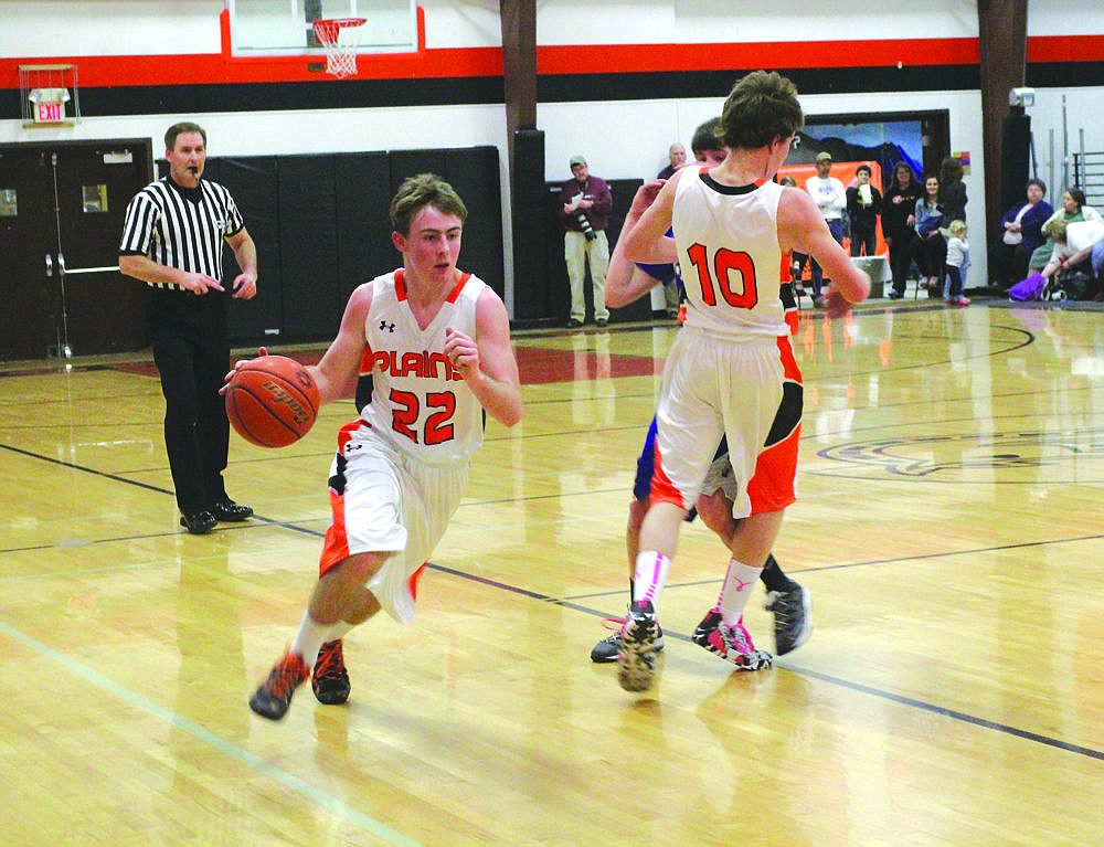 &lt;p&gt;Alec Cole gets by a Bluehawk defender with help from Horsemen teammate Ryan Ovitt.&lt;/p&gt;