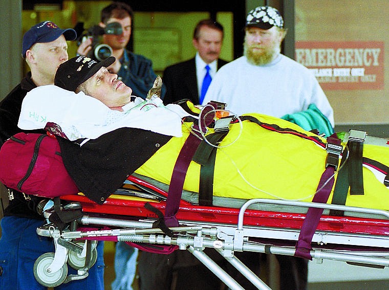 &lt;p&gt;Olympic skiing champion Bill Johnson is wheeled out of the emergency-room door at Kalispell Regional Medical Center in April 2001 en route to a medical jet that took him to Portland. At left is Erik Rosendahl of the Kalispell fire/ambulance crew. At right is Jimmy Cooper, Johnson&#146;s stepfather. In the background is hospital spokesman Jim Oliverson.&lt;/p&gt;