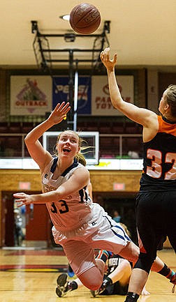 &lt;p&gt;Timberlake&#146;s Keelie Lawler puts up a shot as she is tripped in the fourth quarter against Priest River.&lt;/p&gt;