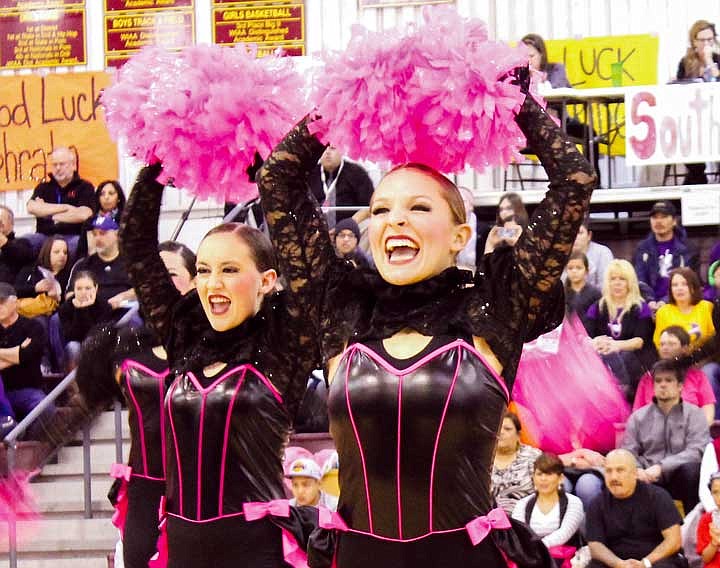 Two Molahiettes cheer during their Pom demonstration routine at the second annual Moses Lake Dance/Drill Invite on Saturday.