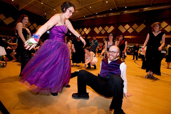 &lt;p&gt;Steven Kirsebom gets low on the dance floor as his date Abbey Waterdown twirls beside him on Friday at the Night to Shine prom at Real Life Ministries in Post Falls. Sponsored by the Tim Tebow Foundation, Night to Shine prom is an annual dance for people with physical and mental disabilities, and is held in hundreds of locations throughout the county.&lt;/p&gt;