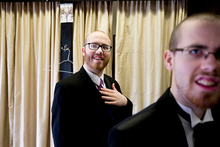 &lt;p&gt;Steven, left, and Trevor Kirsebom check themselves out in the mirror as they try on tuxedos on Friday, Feb. 5, 2016 for upcoming Night to Shine prom. Sponsored by the Tim Tebow Foundation, Night to Shine prom is an annual dance for people with physical and mental disabilities, and is held in hundreds of locations throughout the county.&lt;/p&gt;