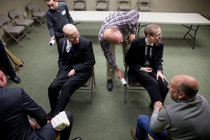 &lt;p&gt;Steven, left, and Trevor Kirsebom have their shoes shined and tuxedos cleaned before they meet their dates at the Night to Shine prom on Friday at Real Life Ministries in Post Falls. Sponsored by the Tim Tebow Foundation, Night to Shine prom is an annual dance for people with physical and mental disabilities, and is held in hundreds of locations throughout the county.&lt;/p&gt;