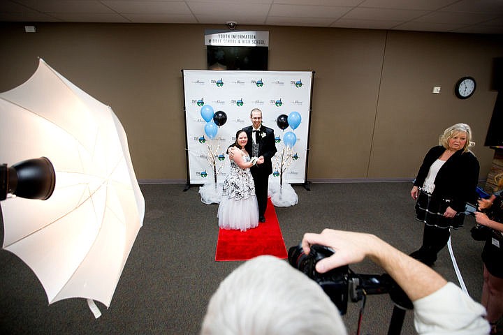 &lt;p&gt;JAKE PARRISH/Press Nikki Cotter and her boyfriend and prom date Trevor Kirsebom pose for a photo as they arrive at the Night to Shine prom on Friday, Feb. 12, 2016 at Real Life Ministries in Post Falls. Sponsored by the Tim Tebow Foundation, Night to Shine prom is an annual dance for people with physical and mental disabilities, and is held in hundreds of locations throughout the county.&lt;/p&gt;