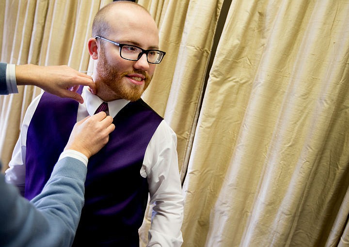 &lt;p&gt;Steven Kirsebom has his tie and collar fitted by Touchdown Tuxedo owner Steve Wasson on Friday, Feb. 5, 2016, as he prepares for the next week's Night to Shine prom.&lt;/p&gt;