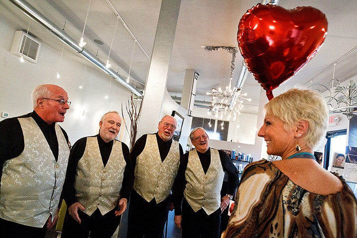 &lt;p&gt;Tina Crane, a stylist at Blondie's Salon, is serenaded Friday by a quartet with the Lake City Harmonizers, from left, Bob Donahue, Joe Lykins, Dick Wagner, and Bob Brown, as a Valentine surprise from her husband. The group, in its 30th year, is currently taking orders to deliver sweets and sweet harmony.&lt;/p&gt;