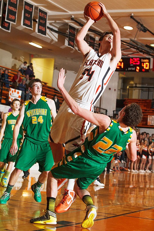 &lt;p&gt;Flathead&#146;s Garth West (44) shoots over Whitefish&#146;s Jace Kalbfleisch (22) Tuesday night during a nonconference basketball game against Whitefish at Flathead High School. (Patrick Cote/Daily Inter Lake)&lt;/p&gt;