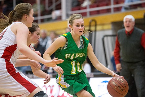 &lt;p&gt;Lakeland&#146;s Emily Vanderhoof dribbles around Sandpoint&#146;s defense Wednesday during the 3A region 1 championship game.&lt;/p&gt;