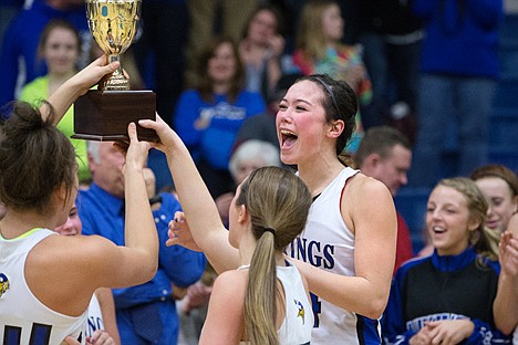 &lt;p&gt;Brittany Tackett shouts and jumps in the air as the Coeur d&#146;Alene High School girls are presented with the 5A region 1 championship trophy Wednesday after the team defeated Lewiston.&lt;/p&gt;