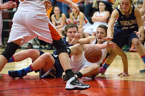 &lt;p&gt;Timberlake's Jessica Norlander, left, and Jill Weimer fight for the ball Wedenday as Timberlake took on Priest River during the 5A region 1 tournament.&lt;/p&gt;