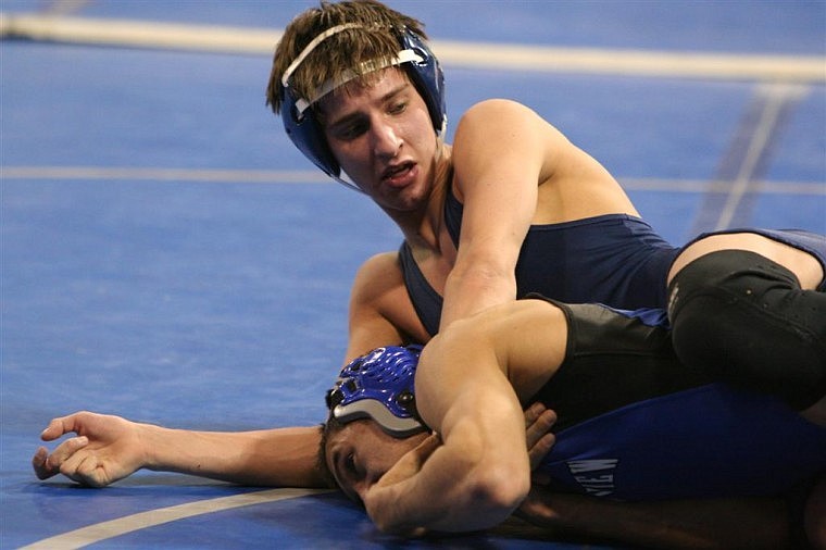 Glacier&#146;s Cooper Sipe wrestles Matt Nguyen of Billings Skyview in the championship quarterfinals at 130 on Friday. Nguyen won a 4-2 decision.