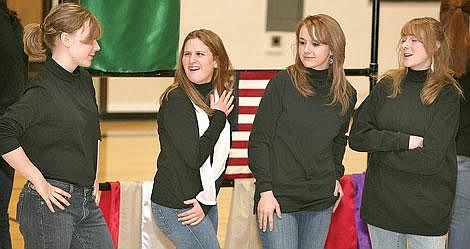 Photo by Ed Moreth&lt;br&gt;Abbie Starkey reacts to a question about what she and her boyfriend have done in the play &quot;How to Make an American Teenage Quilt&quot; in the Plains High School gymnasium Friday. It was one of eight different scenarios the Plains Drama Club put on for their classmates. The actors from the left are: Leah Swedberg, Starkey, Taylor Boles, and Bethany Mack.