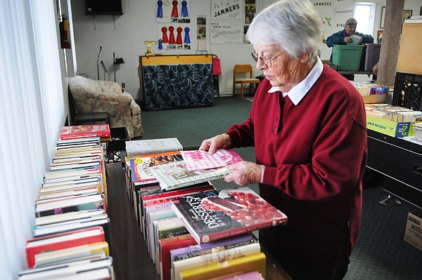 &lt;p&gt;Blanche Zenz, of Columbia Falls, lays out book for the annual
North Valley Senior Center Book and Puzzle Sale on Thursday
afternoon in Columbia Falls. The sale starts today and continues on
Saturday. The sale will be open to the public from 9 a.m. to 4 p.m.
both days.&lt;/p&gt;