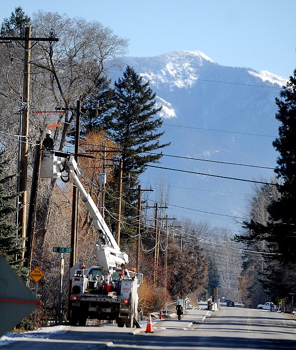 &lt;p&gt;Crews from Flathead Electric work to upgrade power lines along
E. Evergreen Road from single phase to three phase on Tuesday
afternoon in Evergreen.&lt;/p&gt;
