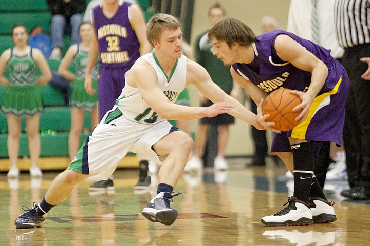 &lt;p&gt;Wolfpack sophomore Evan Epperly (left) tries to steal the ball
from Missoula's Alec Bray during Glacier's home matchup against
Missoula Sentinel on Tuesday night.&lt;/p&gt;