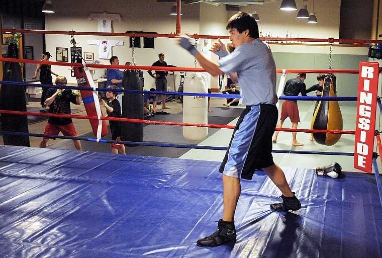 Dennis Marceau of Whitefish and others training at Straight Blast Gym on Wednesday night in Kalispell. The grand opening for the new location is this Saturday from 10 to 5.