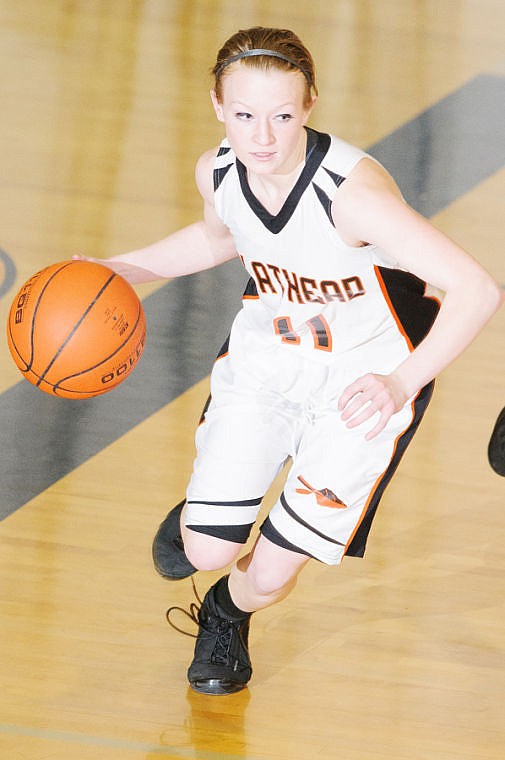 &lt;p&gt;Flathead's Dani Davis brings the ball up the court Tuesday night during Flathead's nonconference basketball game against Whitefish. (Patrick Cote/Daily Inter Lake)&lt;/p&gt;