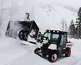 Big Creek buried, but Parsons Tractor comes to the rescue