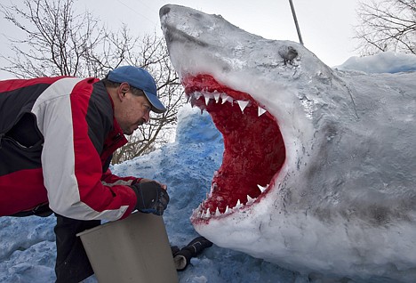 &lt;p&gt;Stephen Garcia works on a giant snow sculpture of a shark in the front yard of his home, in Grand Rapids, Mich. Garcia said the shark is a work in progress that he plans to improve over the next two weeks. &quot;I love to see people get excited by this,&quot; he said. &quot;The more people that come, the more motivated I get.&quot;&lt;/p&gt;