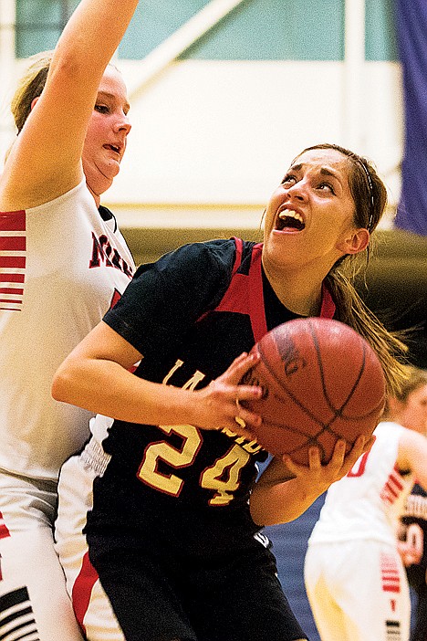 &lt;p&gt;Lakeside High School&Otilde;s Deeanna Crowe drives to the hoop against Wallace defender Jordan Browning in the fourth quarter.&lt;/p&gt;