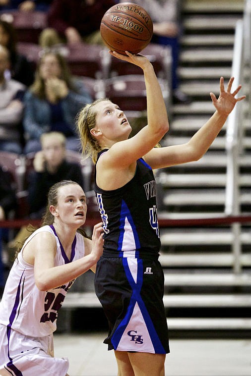 &lt;p&gt;JEROME A. POLLOS/Press Sydney Williams from Coeur d'Alene High goes up for a shot in front of Rocky Mountain High's Megan Hochstein.&lt;/p&gt;