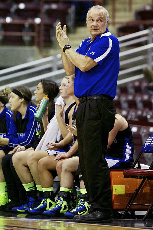 &lt;p&gt;JEROME A. POLLOS/Press Dale Poffenroth, Coeur d'Alene High's head coach, applauds his teams efforts toward the end of the first half.&lt;/p&gt;