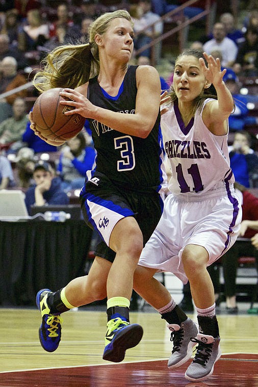 &lt;p&gt;JEROME A. POLLOS/Press Coeur d'Alene High's Madison Sumner drives the lane past Noelle Aragon from Rocky Mountain High.&lt;/p&gt;