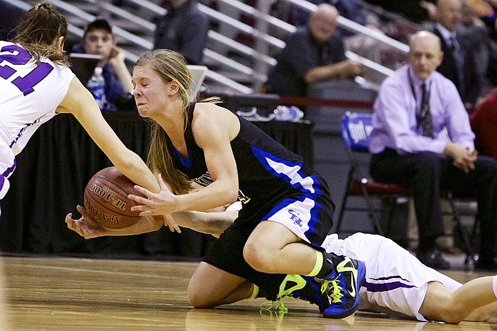 &lt;p&gt;JEROME A. POLLOS/Press Coeur d'Alene High's Madison Sumner gets in between to Rocky Mountain High players to gain control of a loose ball.&lt;/p&gt;