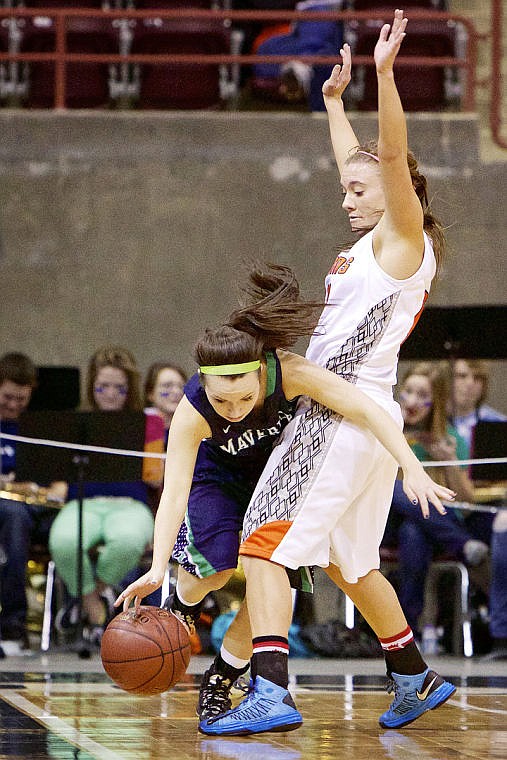 &lt;p&gt;JEROME A. POLLOS/Press Post Falls High's Katie King forces Kayla Moore from Mountain View High to the sideline to move up court.&lt;/p&gt;