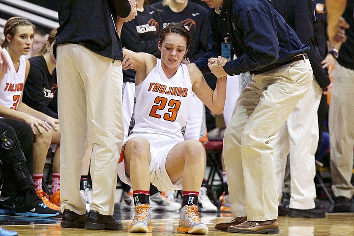 &lt;p&gt;JEROME A. POLLOS/Press Brooke Litalien from Post Falls High is helped to her feet after taking a hard fall in a collision with a Mountain View High player.&lt;/p&gt;