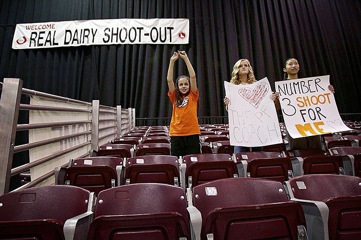 &lt;p&gt;JEROME A. POLLOS/Press Jayda Johnson, 10, left, Payton Allert, 15, and Maia Anderson, 15, show their support for Post Falls High as the only spectators in the student's section for the Trojans in the opening 5A game in the Idaho State basketball tournament Thursday at the Idaho Center in Nampa.&lt;/p&gt;