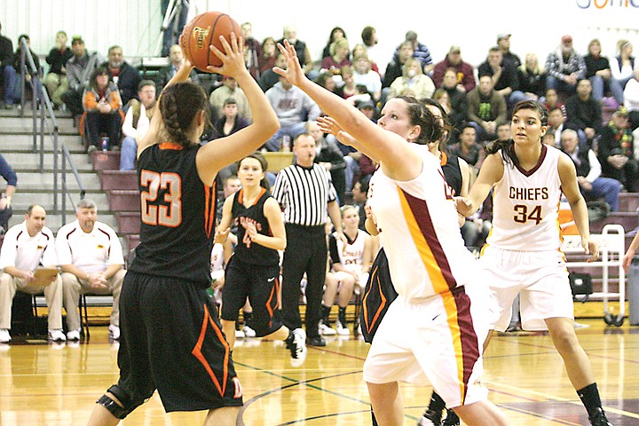 Moses Lake's Sadie Nielsen (center) and the team's defense helped them beat Davis on Friday night.