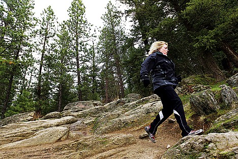 &lt;p&gt;Julie Lilenkamp navigates the trail on Tubbs Hill during a recent run in Coeur d'Alene. Lilenkamp is currently training for an upcoming trip where she plans to climb Mount McKinley in Alaska's Denali National Park and Preserve.&lt;/p&gt;